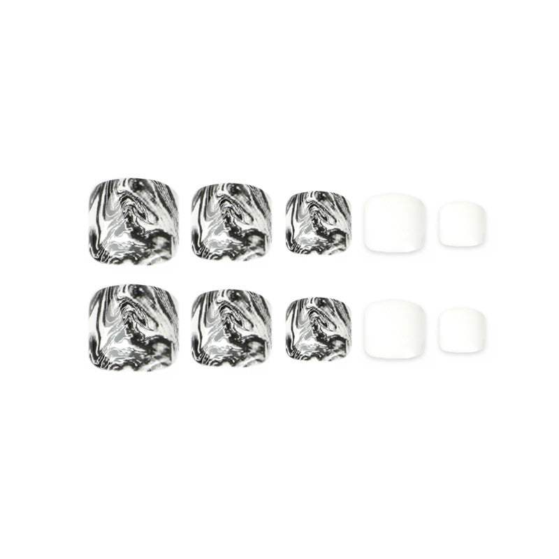 Artful toenail art in elegant marble design Bowlift