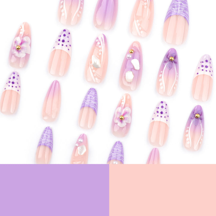 Artful nail extensions with elegant floral embellishments Bowlift