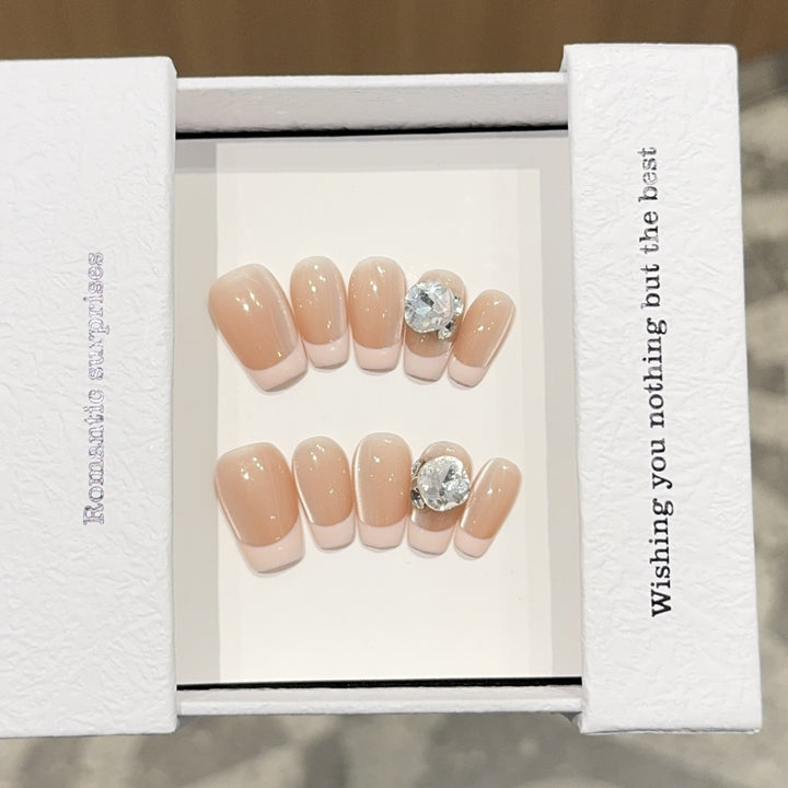 Artificial nail tips with elegant rhinestone accents Bowlift