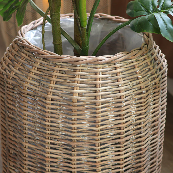 Stylish laundry basket made of braided natural material Bowlift