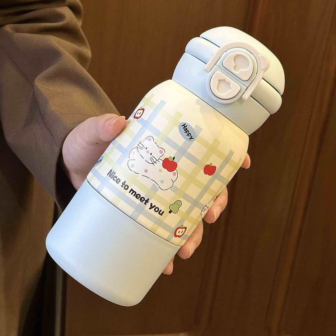 Women's insulated drinking bottle with practical flip lid and cheerful design Bowlift