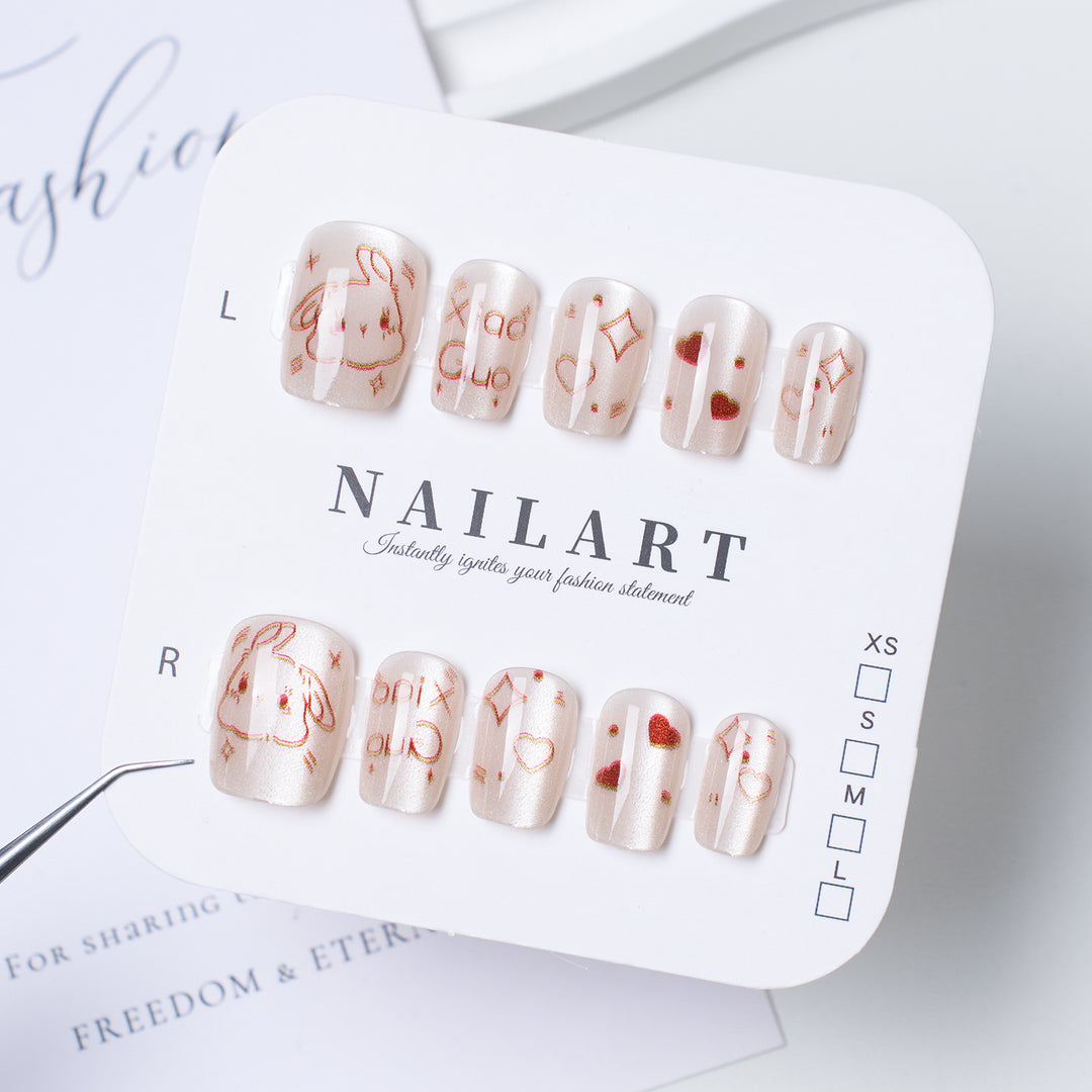 Decorative Press-On Nail Extensions with Bow and Rhinestone Accents Bowlift