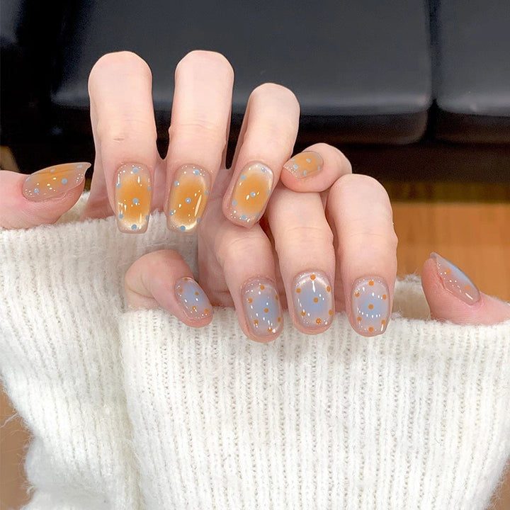 Artistic Press-On Nail Set with Floral and Glossy Accents Bowlift