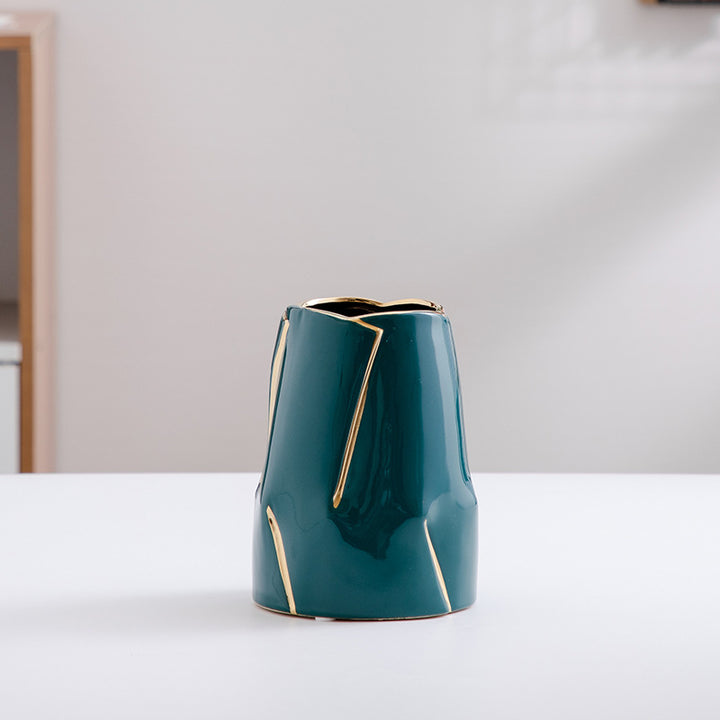 Decorative ceramic vase with golden accents Bowlift