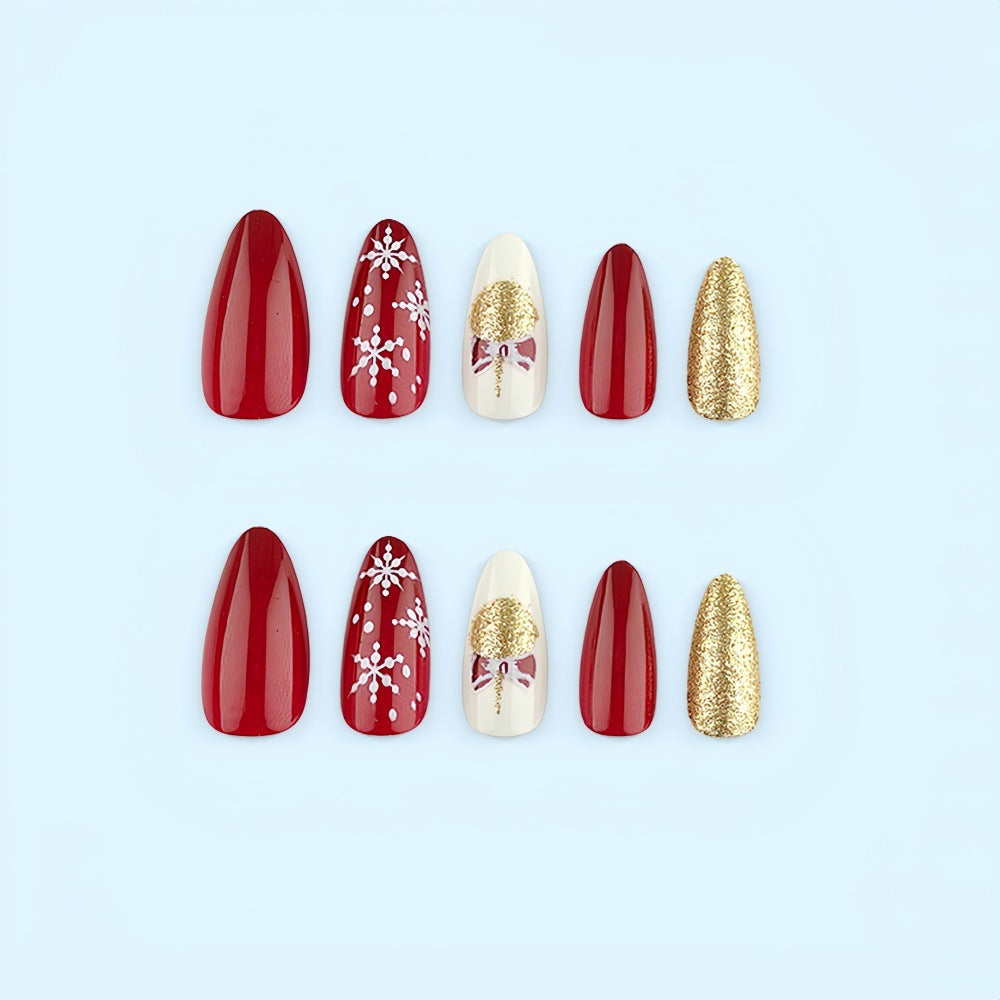 Glamorous artificial nails in festive Christmas design Bowlift