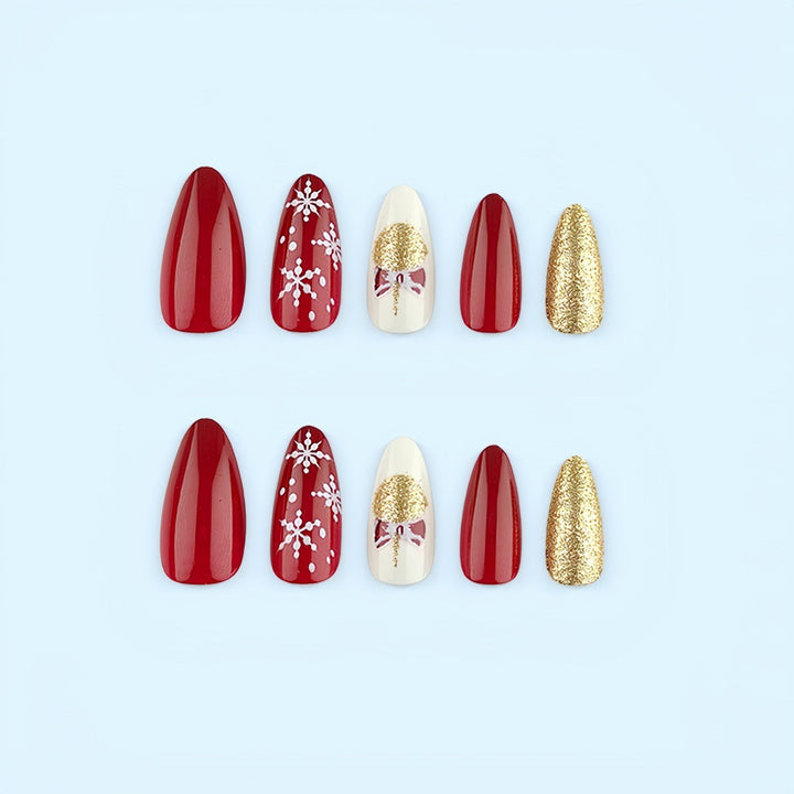 Glamorous artificial nails in festive Christmas design Bowlift