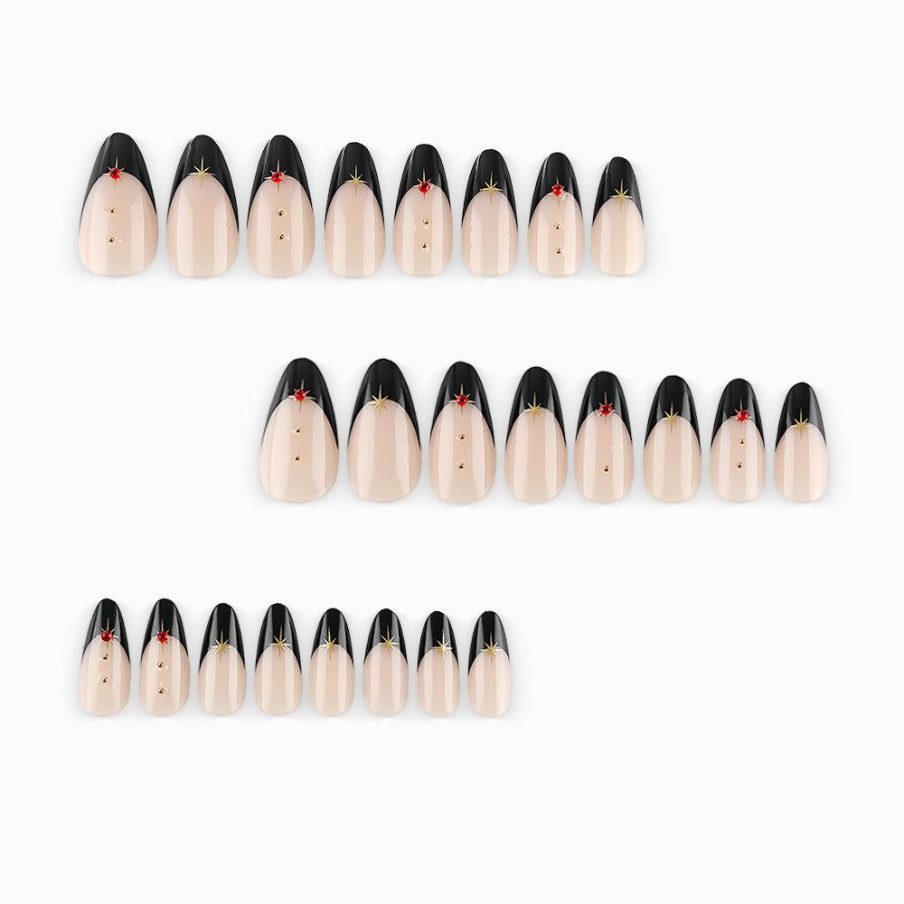 Glamorous artificial nails in stylish stiletto design with golden accents Bowlift