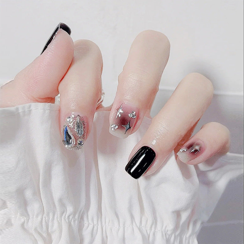 Artificial nail set with glamorous glitter and crystal decorations Bowlift