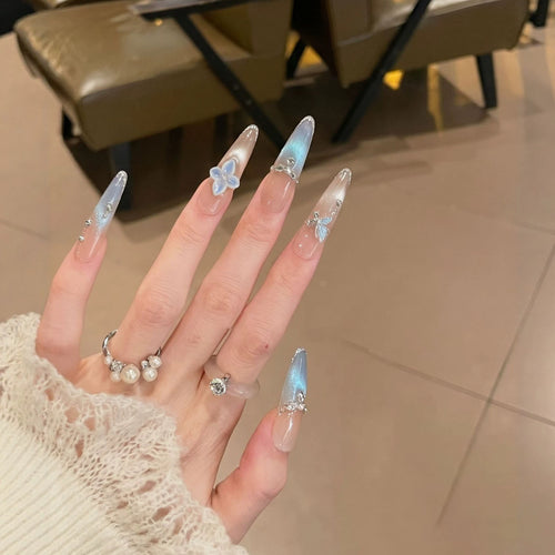 Artistic Press-On Nail Set with Floral and Gemstone Accents Bowlift