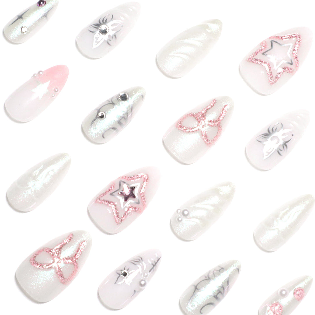 Artistic nail extensions with shiny embellishments Bowlift