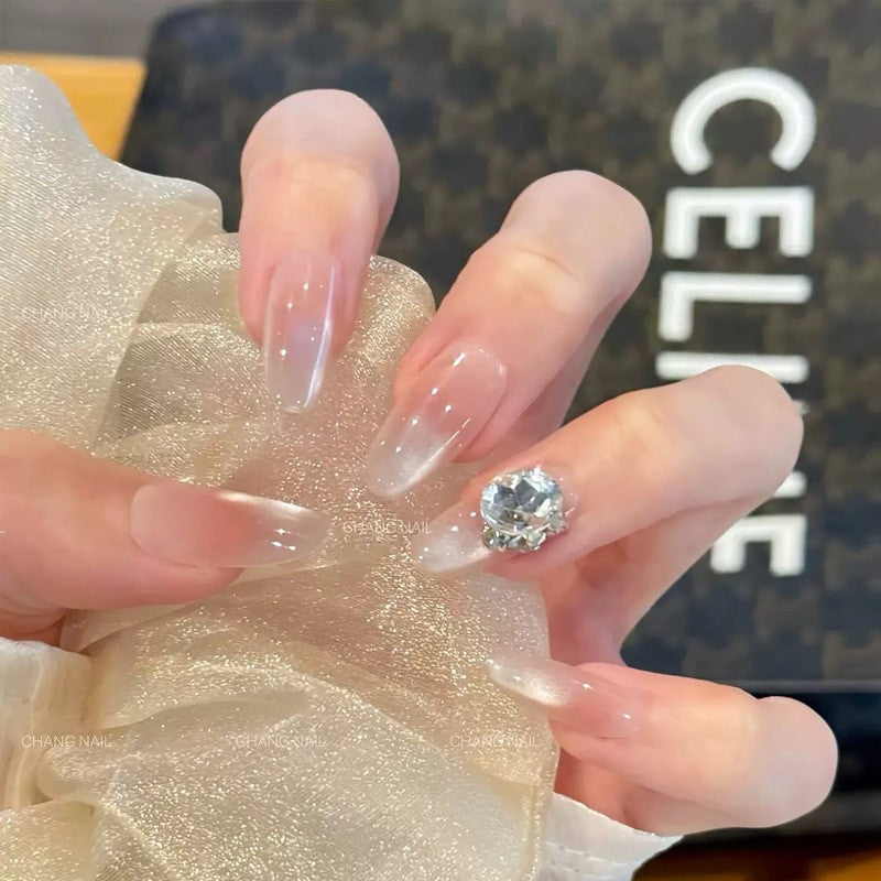Artificial nail set with elegant tips and crystal accents Bowlift
