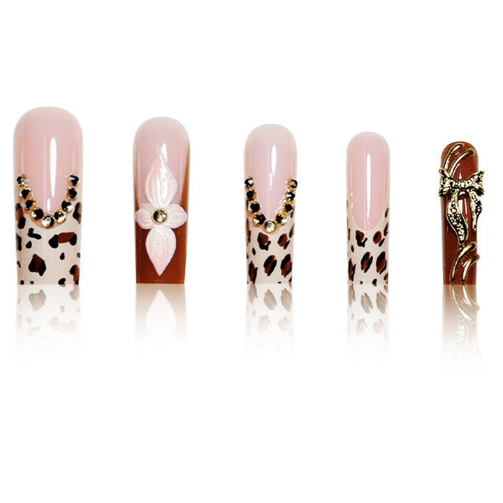 Artistic Long Press-On Nail Extensions with Elegant Floral Design Bowlift