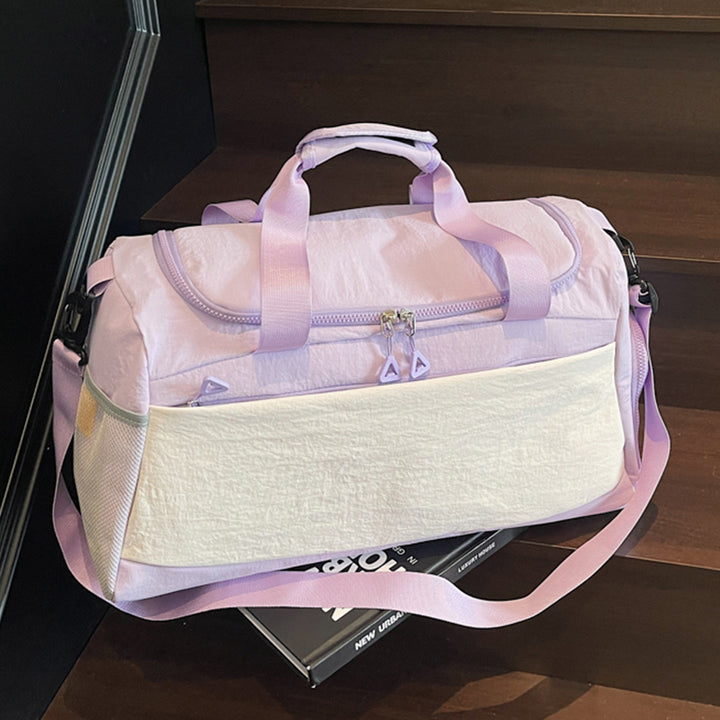 Sporty travel bag with sturdy carrying handles Bowlift