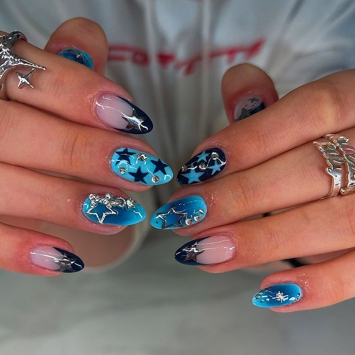 Artificial fingernails with Starlit design and glitter accents Bowlift