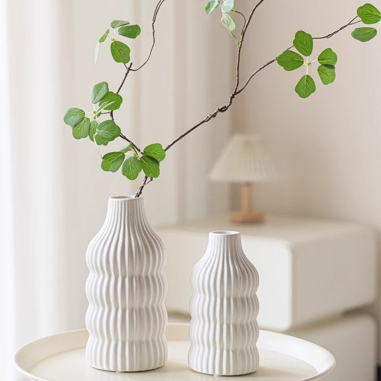 Stylish ceramic vase with wave structure Bowlift