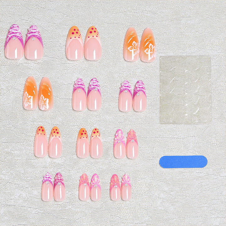 Acrylic nail set with exotic flower patterns and glitter accents Bowlift