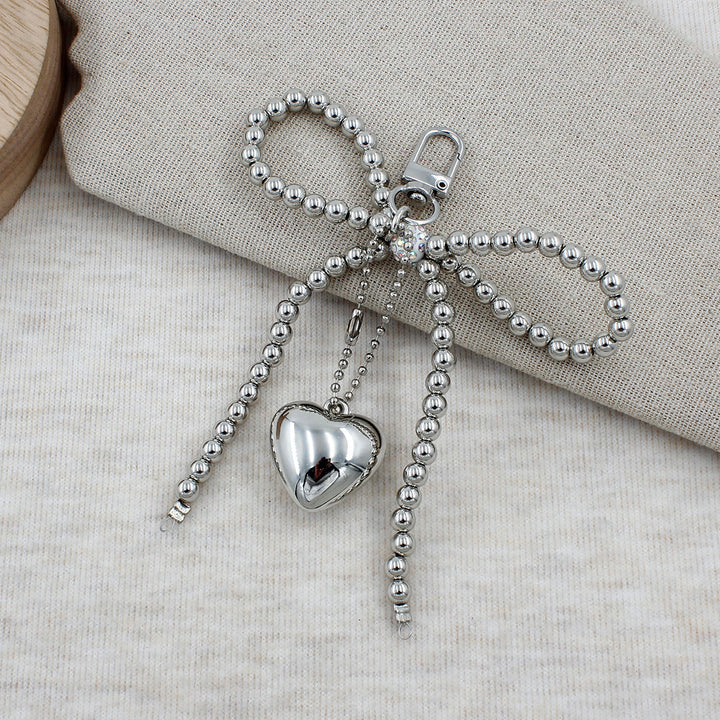 Elegant Beaded Bow Brooch Bowlift