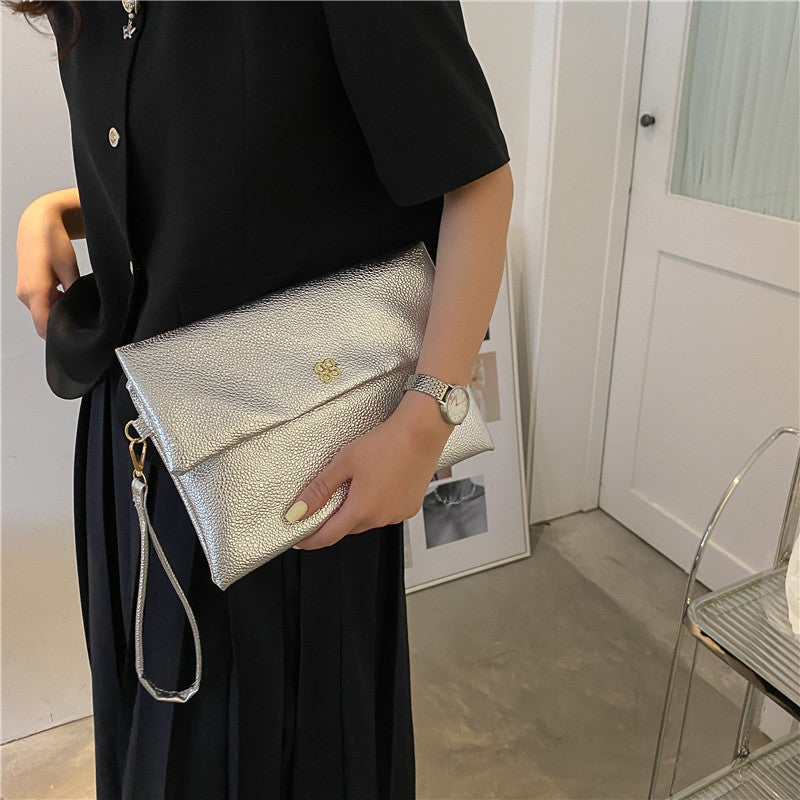Elegant Textured Wristlet Clutch Bowlift
