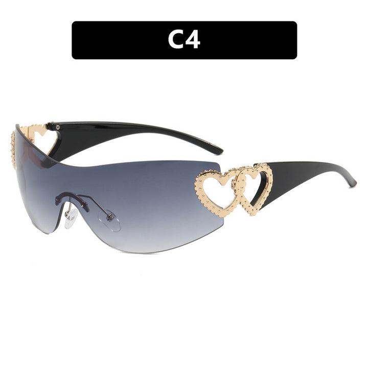 Ladies sporty sunglasses in trendy shield design with heart accents Bowlift