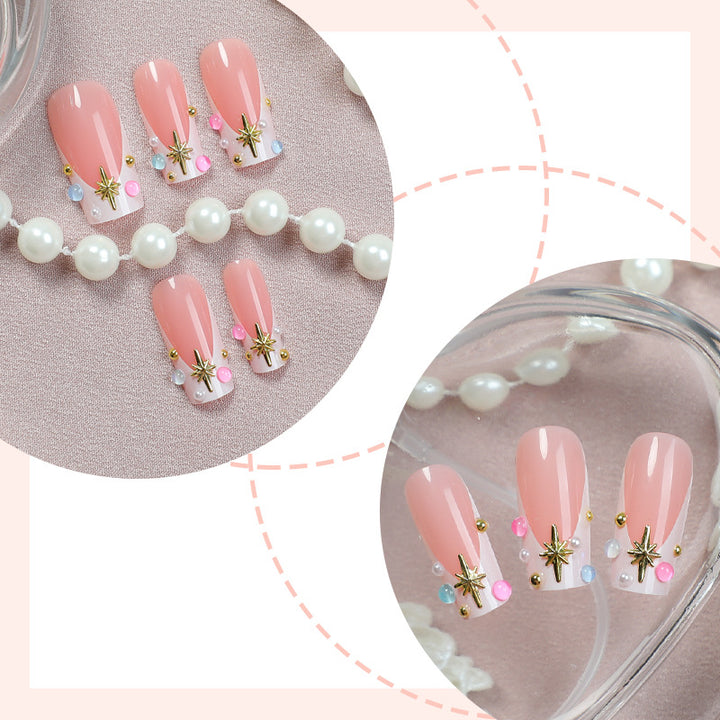 Elegant artificial nail set with floral design and rhinestone accents Bowlift