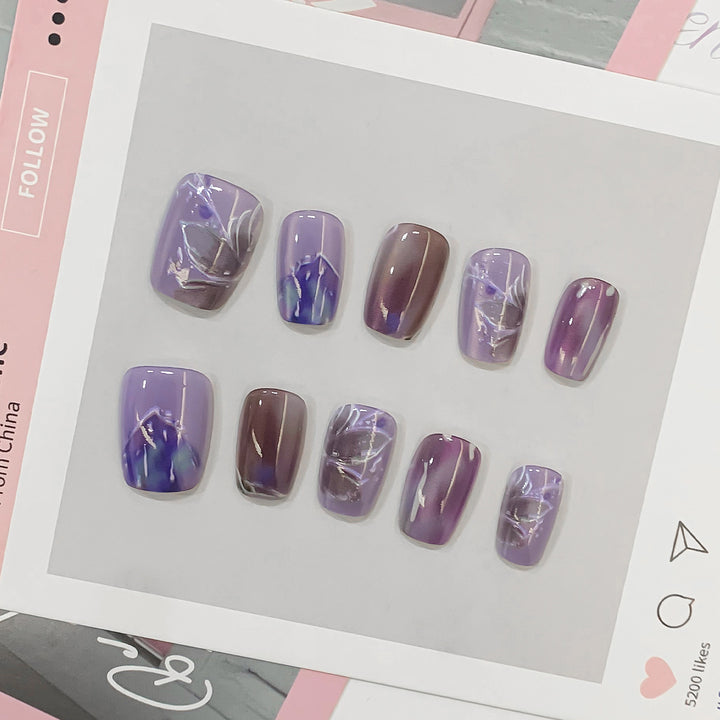 Artful acrylic nails with marbled design Bowlift