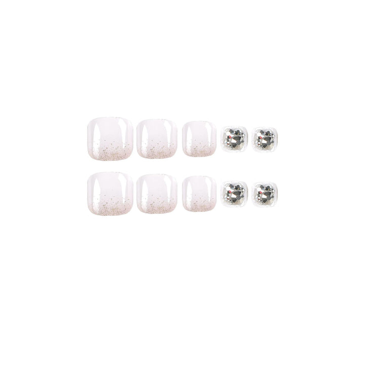 Artful toenail design with sparkling embellishments Bowlift