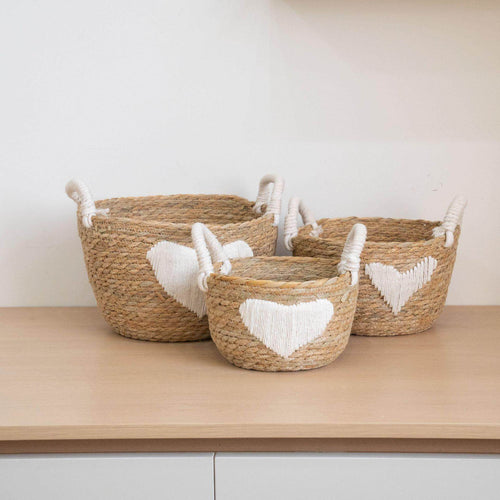 Handwoven storage basket with heart design Bowlift