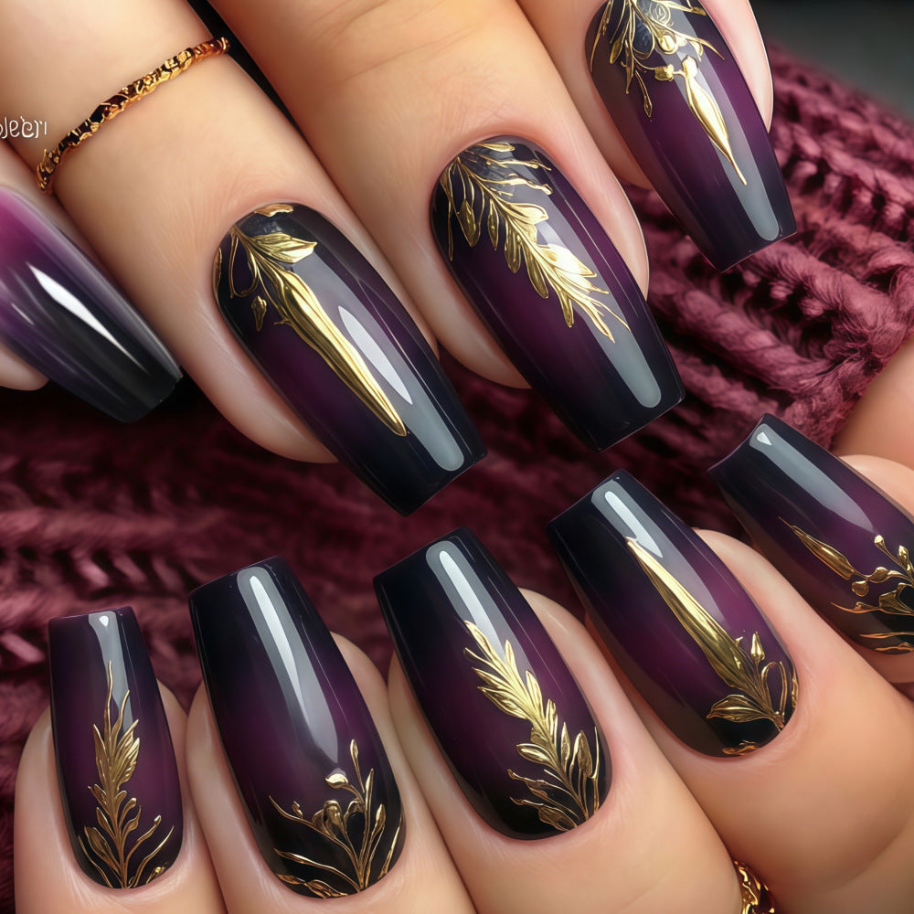 Artificial nails in elegant ombré design with gold accents Bowlift
