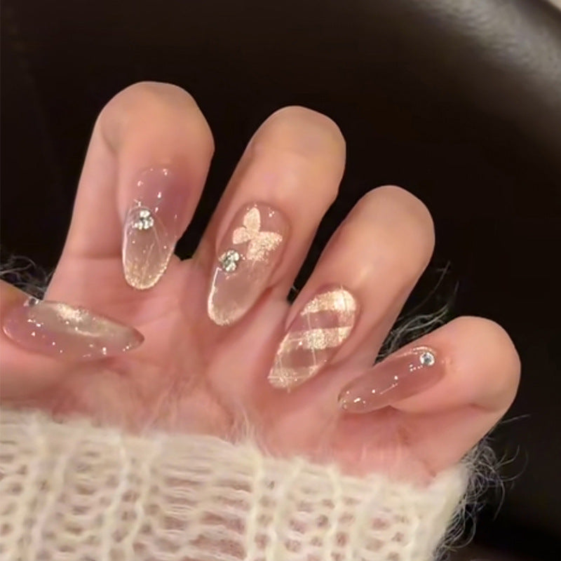 Decorative Press-On Nail Extensions with Bow and Rhinestone Accents Bowlift