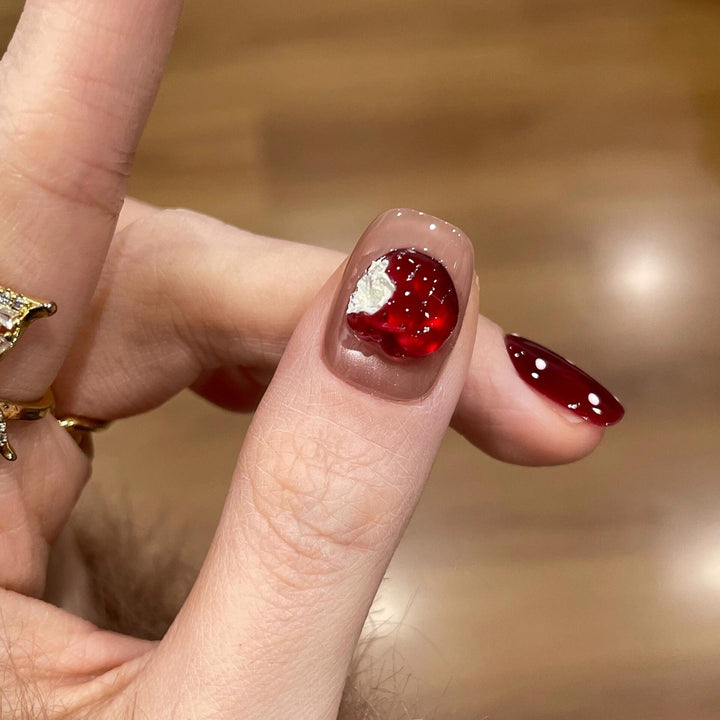 Artificial nails with festive gift design Bowlift