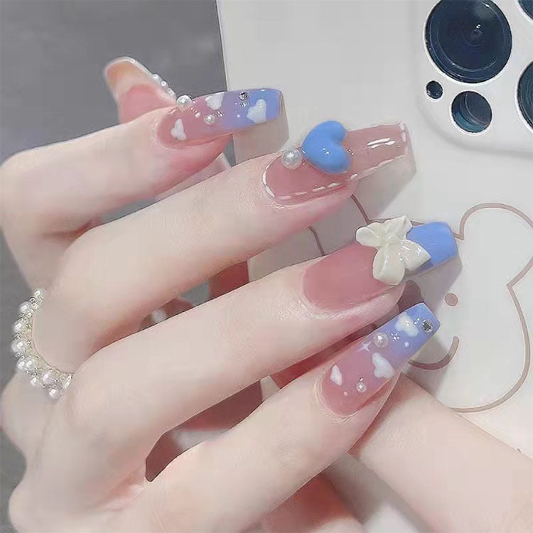 Artificial nails with heart design and glitter accents Bowlift