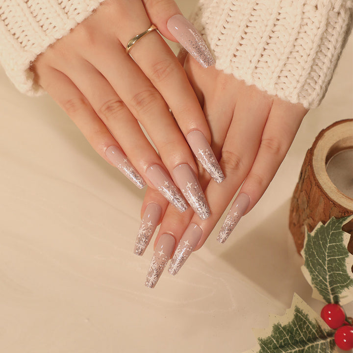 Artful nail art in winter design with glitter and snowflakes Bowlift