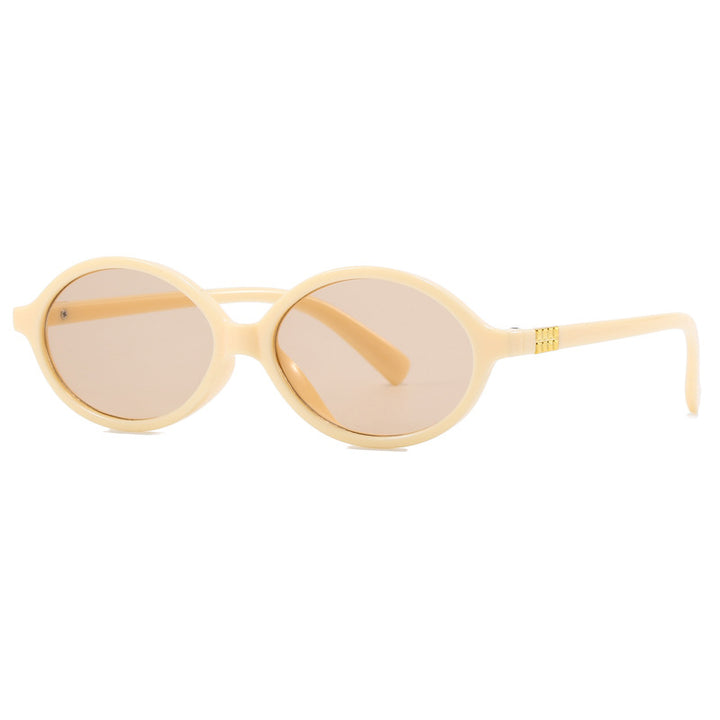 Women's fashionable sunglasses with oval frame and golden accents Bowlift