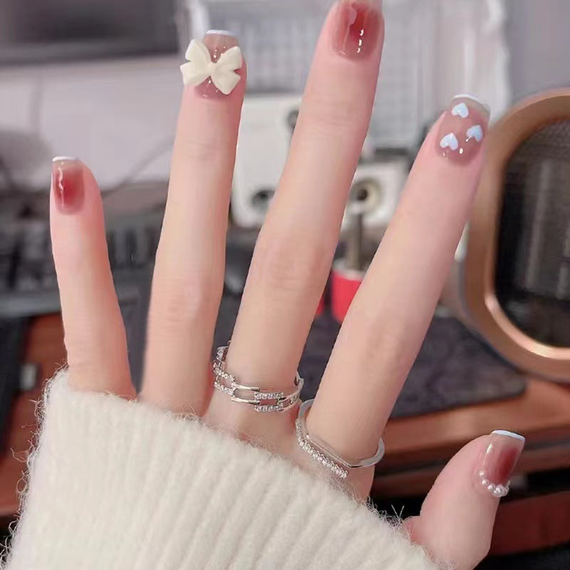 Artistic and elegant nail art with bow accents Bowlift