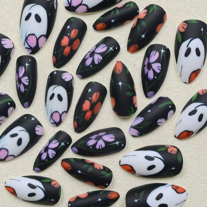 Artificial nail set with floral and spooky designs Bowlift