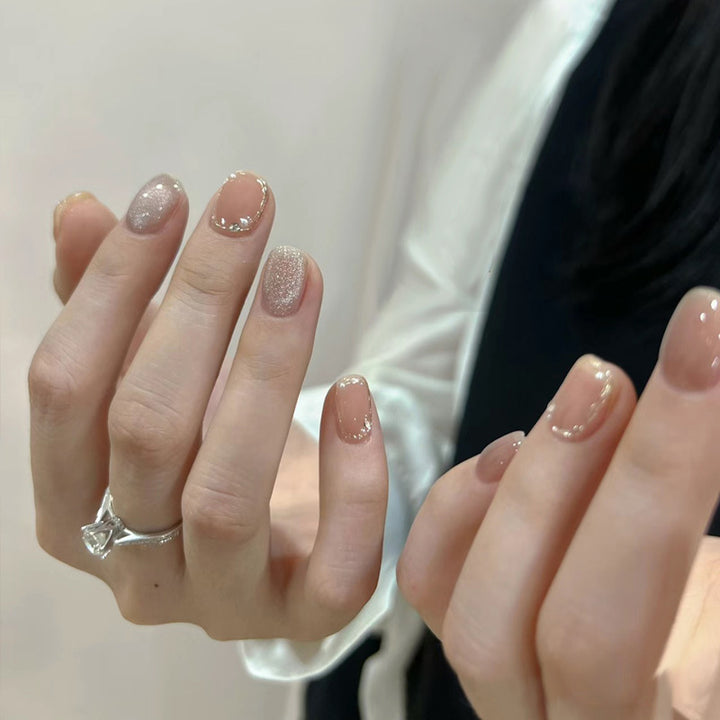 Artistic Press-On Nail Set with Glittery Star Accents Bowlift