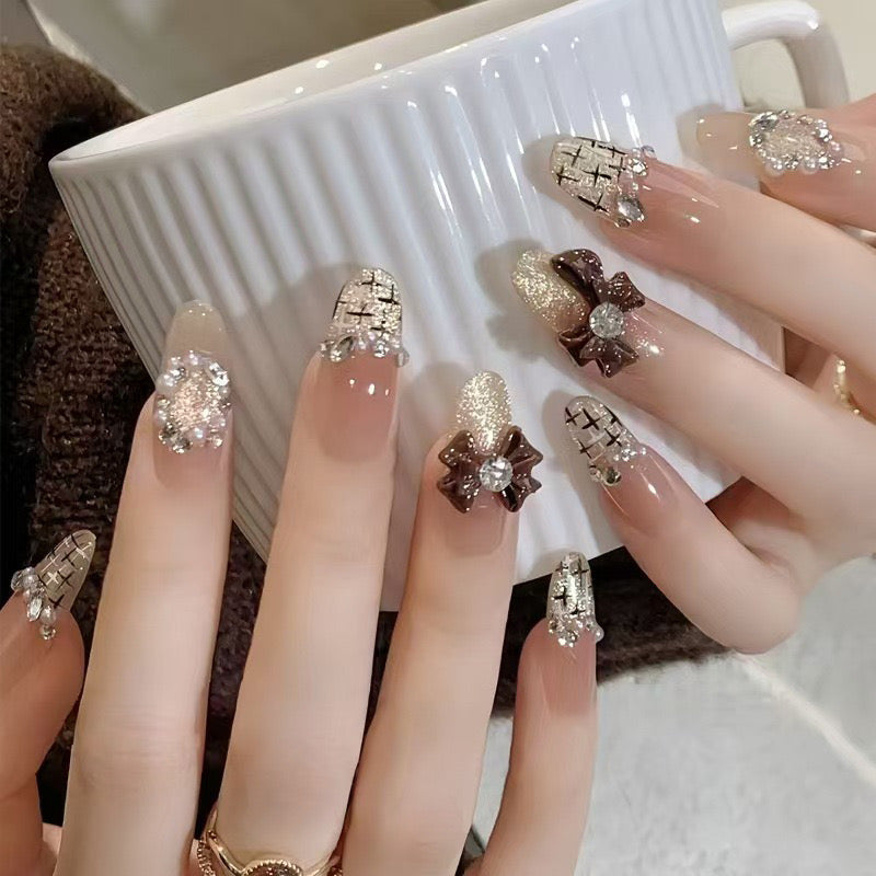 Artificial nails with glamorous decor Bowlift