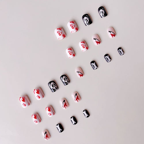 Creative Halloween Nail Art Set with Creepy Designs and Sparkling Accents Bowlift