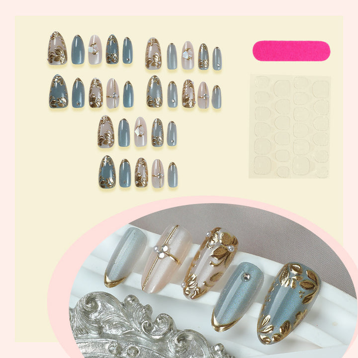 Artificial nail set with floral gold embellishments Bowlift