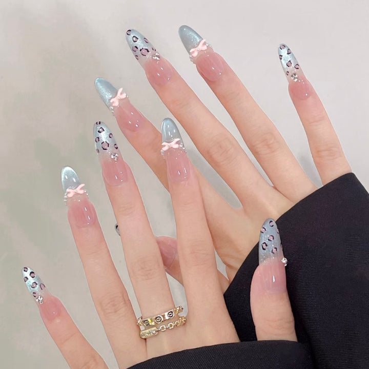 Artistic Stiletto Press-On Nail Set with Leopard Print and Bow Accents Bowlift