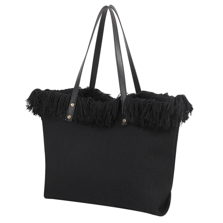 Beach bag with eye-catching fringe edge Bowlift