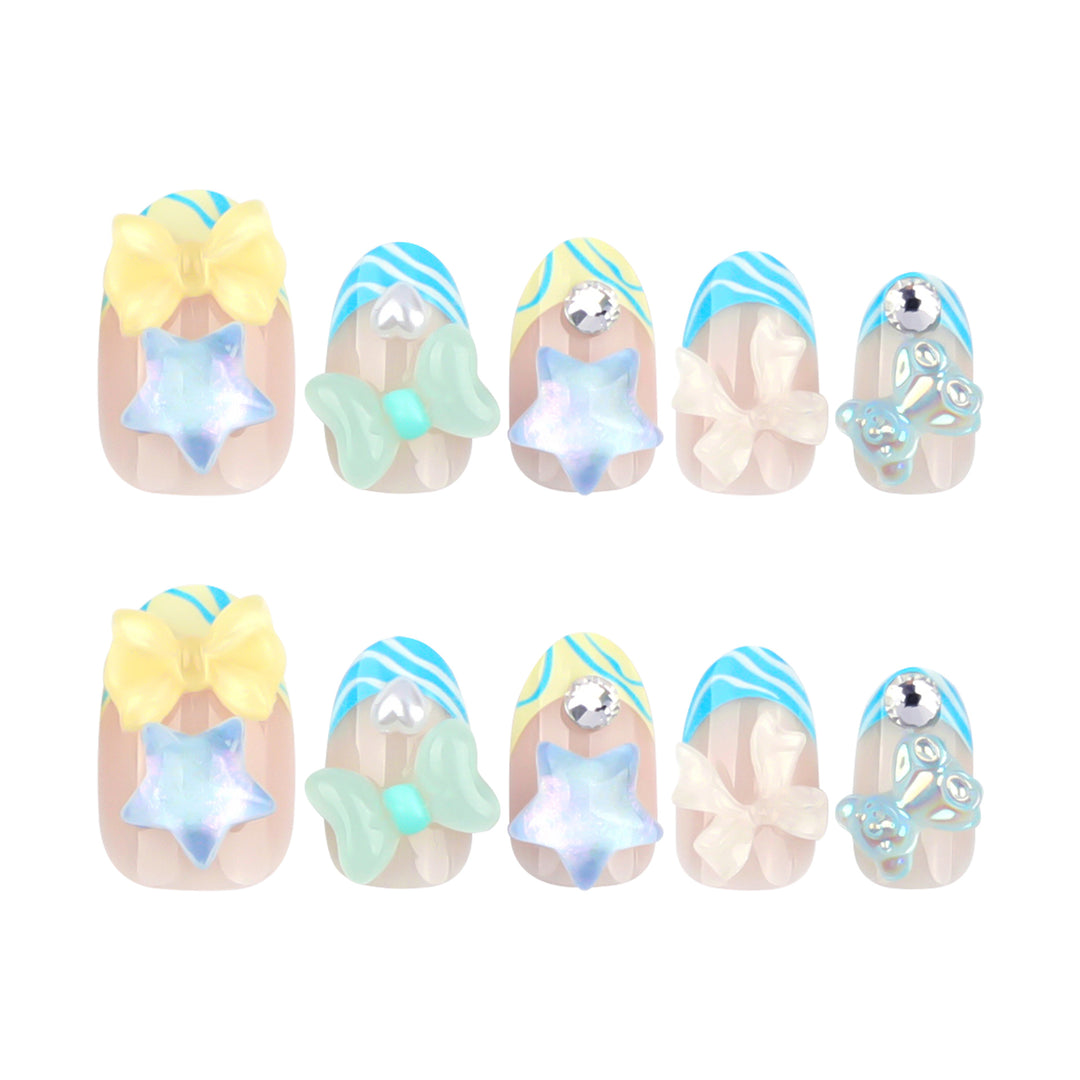 Artificial nail art with colorful pastel designs and 3D embellishments Bowlift