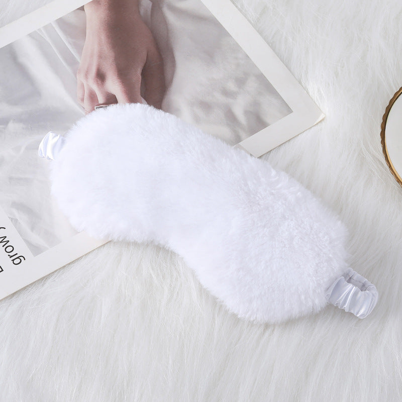Women's cozy sleep mask made of plush with adjustable elastic band and lightproof inner lining Bowlift