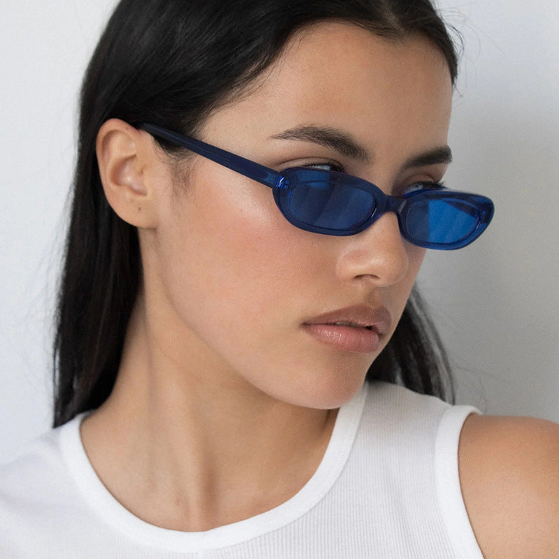 Women's trendy cat-eye sunglasses with transparent plastic frame and UV protection Bowlift
