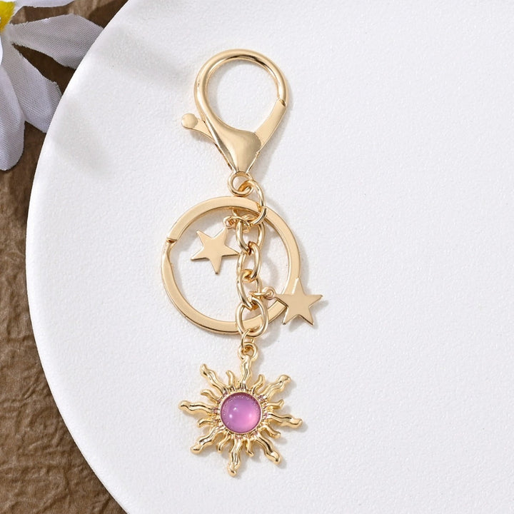 Keychain with Sparkling Sun Motif Bowlift
