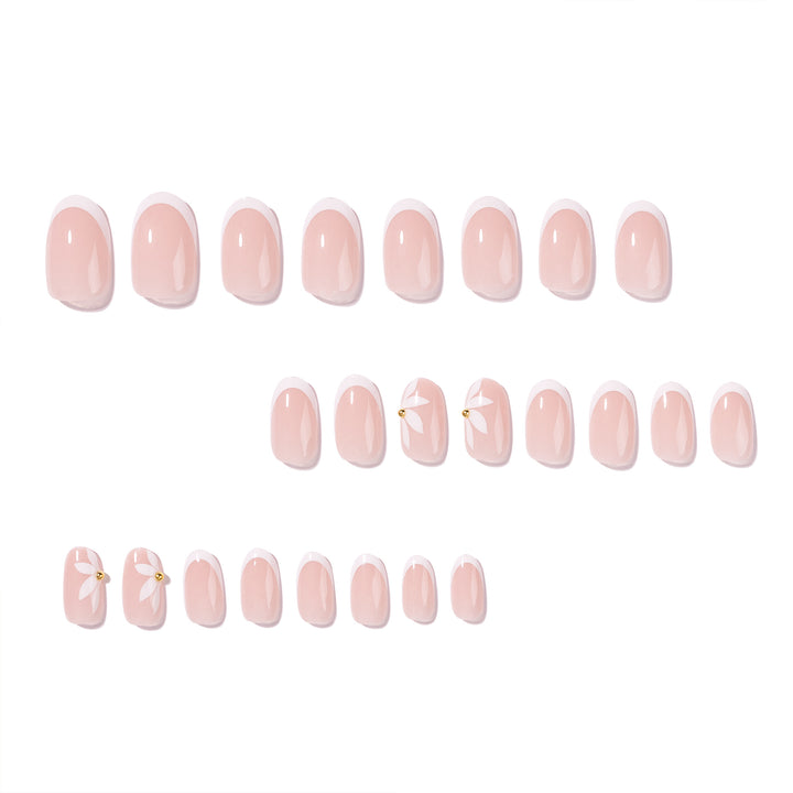 Artful French nails with delicate flowers and glitter accents Bowlift
