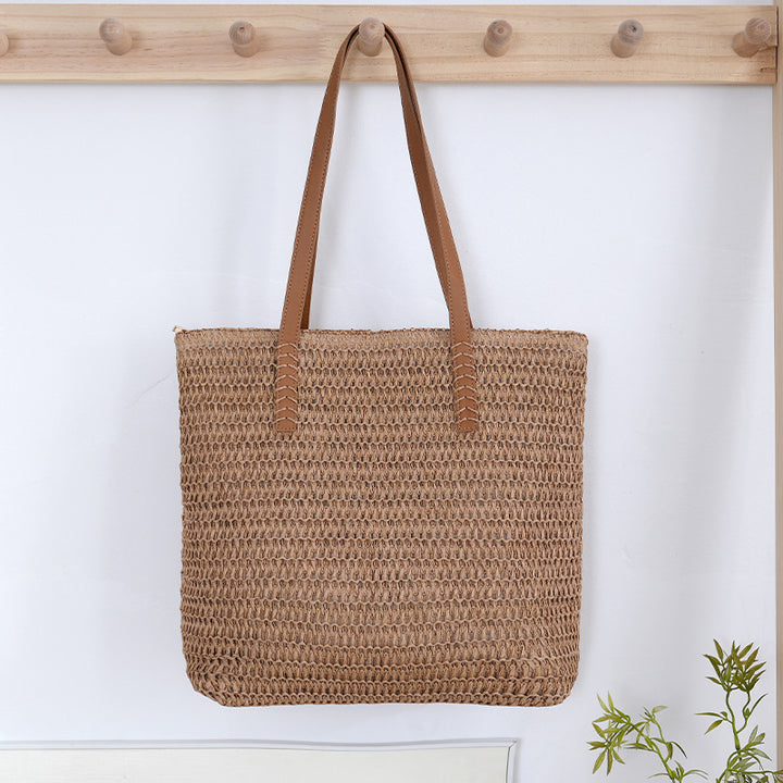 Spacious wicker tote bag with sturdy leather handles Bowlift