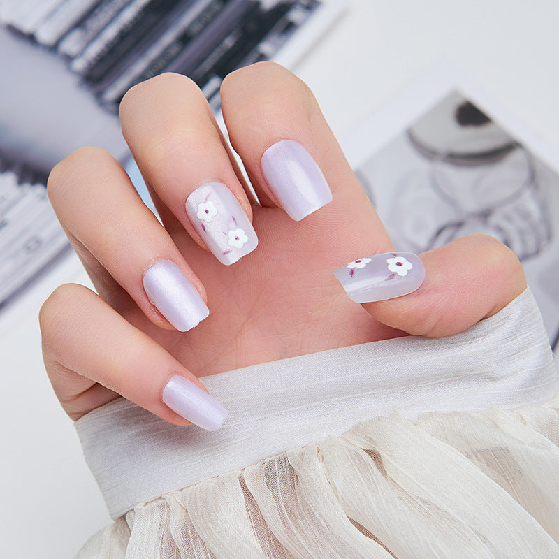 Artistic nail extensions with floral accents Bowlift