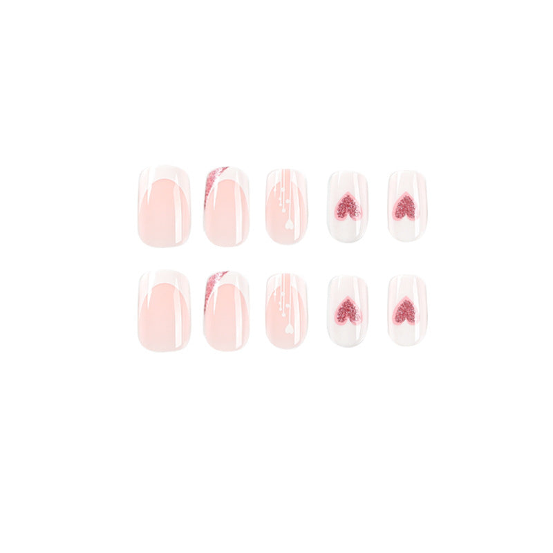 Artful nail designs with heart and glitter accents Bowlift