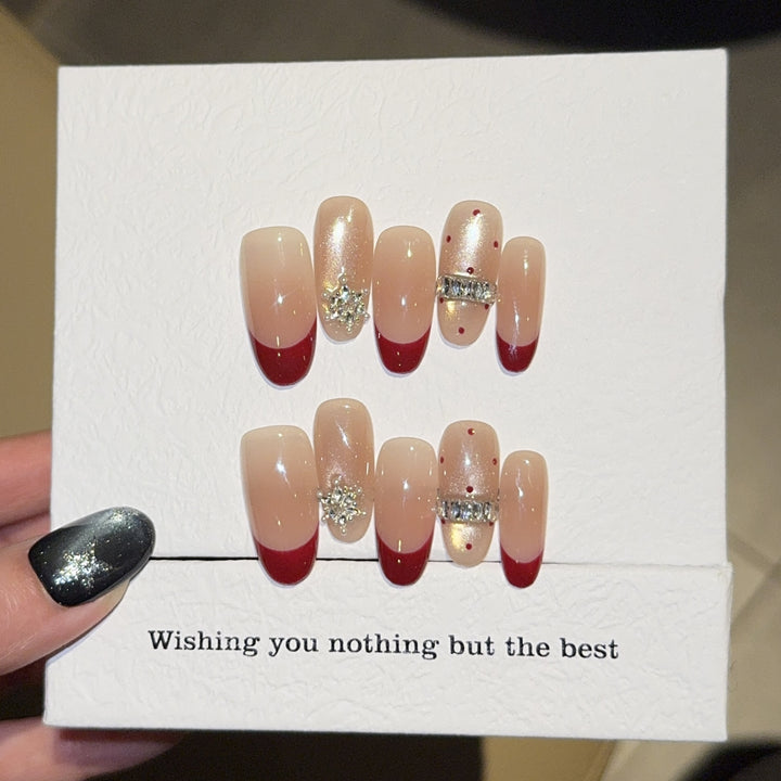 Artificial nails with festive design and rhinestone details Bowlift
